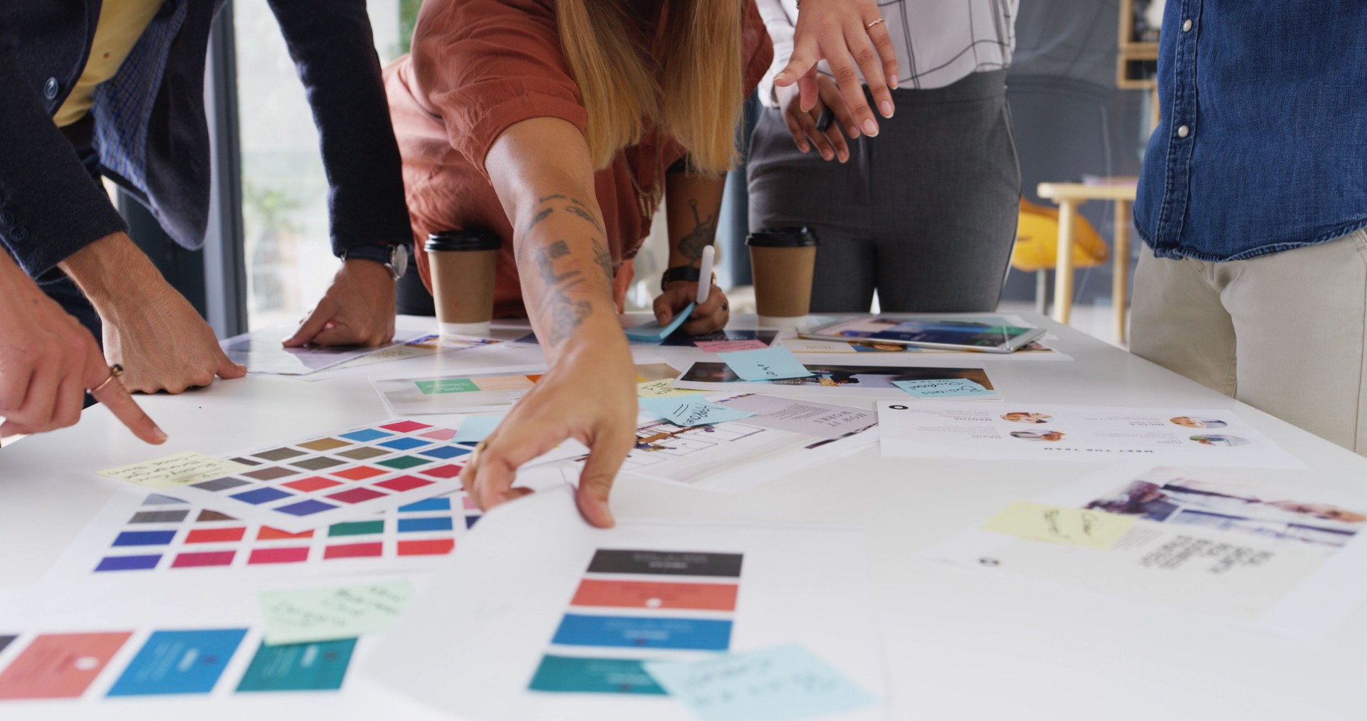 Hands, meeting and group with color, swatch and choice for marketing campaign at startup company. People, team and spectrum with collaboration, decision or brainstorming with design process at agency